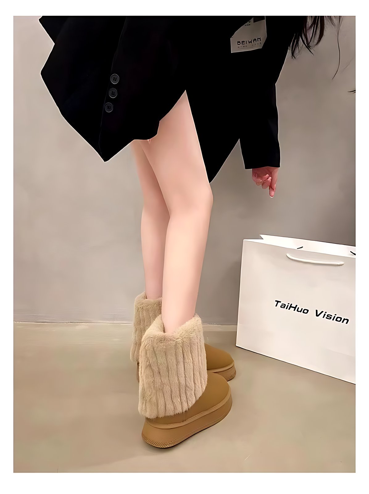 Khaki fleece-lined snow boots on foot, styled with a tailored coat and chunky platform sole